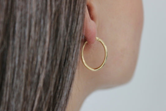 Oval Elegance: Embracing the Timeless Appeal of Gold Oval Hoop Earrings
