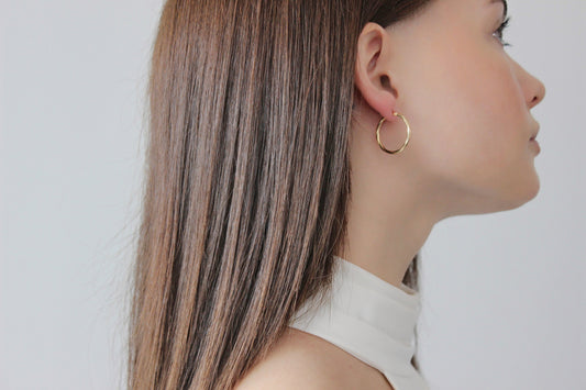 Effortless Elegance: Embracing the Charm of Thin Gold Hoop Earrings